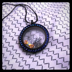 Large locket with Halloween charms.